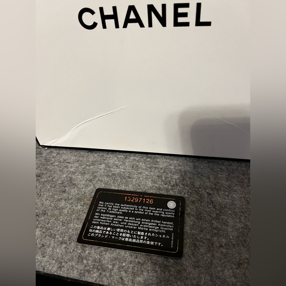 AUTHENTIC Chanel Chevron quilted caviar boy bag.
